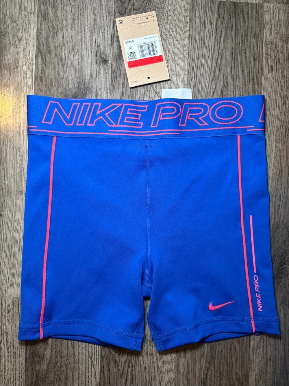 Nike Blue Compression Shorts with Pink Accents